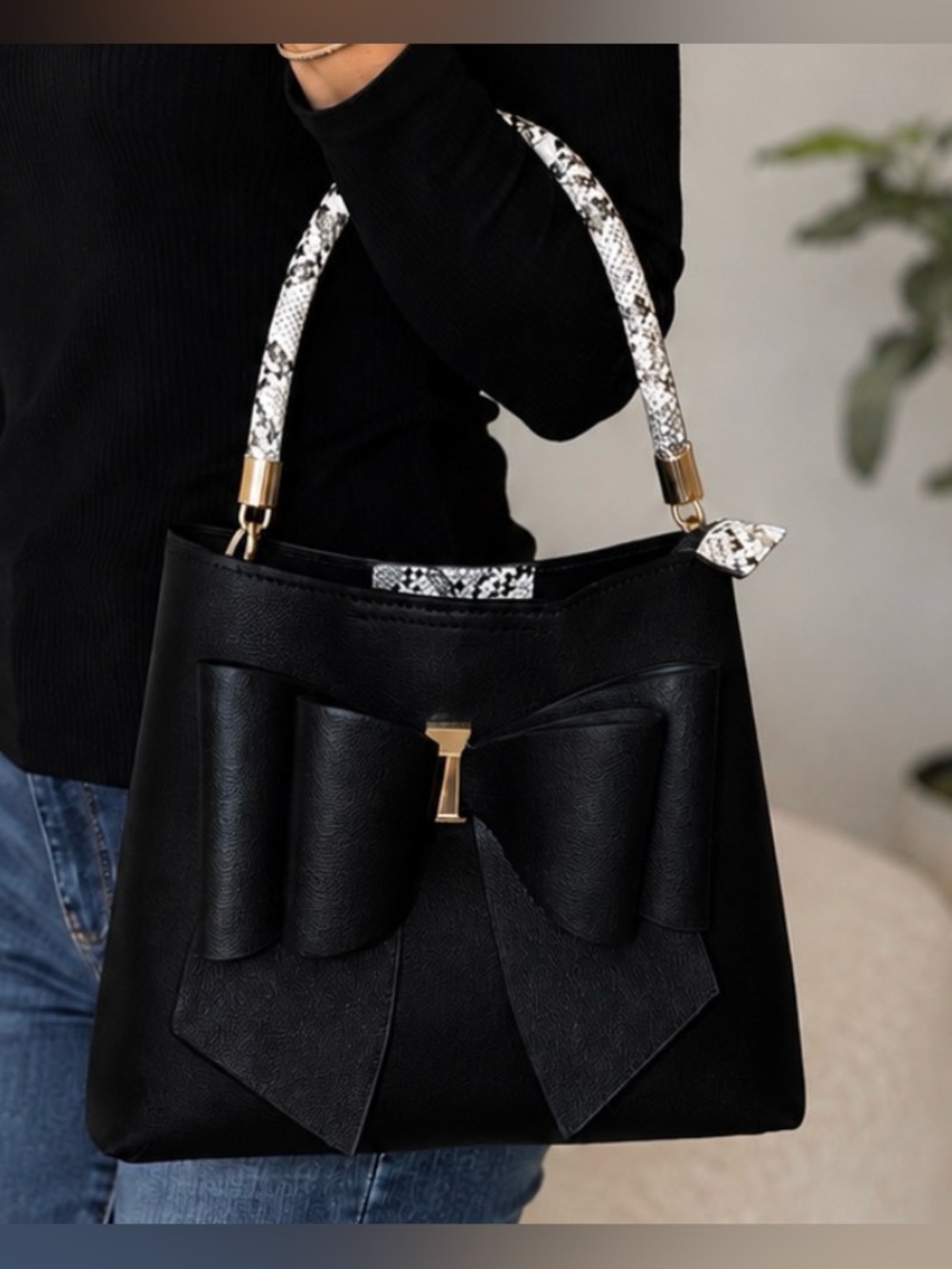 Crossi Black Bow Accent Shoulder Bag with Snake-Print Handle